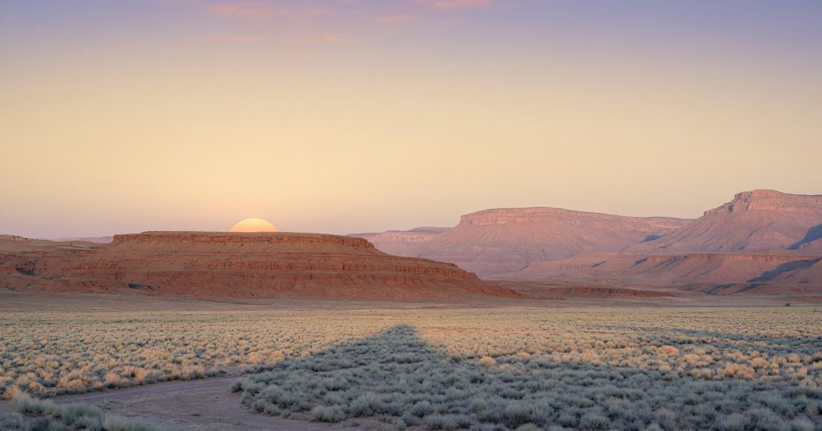 Dawn light over the red-rock mesas of the Four Corners high desert